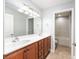 Bright bathroom featuring a double sink vanity with stylish fixtures and tile flooring at 6279 Se 8Th Lane, Ocala, FL 34472