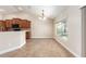 The dining area features a large window offering natural light and a view of the outdoors at 6279 Se 8Th Lane, Ocala, FL 34472