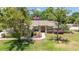 Ranch home featuring a well-manicured lawn and front walkway at 6279 Se 8Th Lane, Ocala, FL 34472