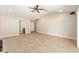 Bright living room featuring tile floors, a ceiling fan, recessed lights, and entryways to other rooms at 6279 Se 8Th Lane, Ocala, FL 34472