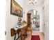 Welcoming foyer with tile flooring, arched doorway, and decorative accents showcasing the home's character at 6450 Sw 83Rd Ln, Ocala, FL 34476