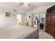 Bedroom with neutral walls, carpet and patio door at 6450 Sw 83Rd Ln, Ocala, FL 34476