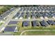 Aerial view of a residential area with well-maintained lawns and green areas at 7374 Sw 77Th Ave, Ocala, FL 34481