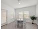 Cozy breakfast nook offering bright, natural light and a charming space for casual dining at 7374 Sw 77Th Ave, Ocala, FL 34481