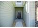 Stylish entryway features stone accents and a welcoming modern door at 7374 Sw 77Th Ave, Ocala, FL 34481