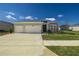 Beautiful single-story home with well-manicured lawn at 7374 Sw 77Th Ave, Ocala, FL 34481