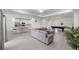 Spacious living room boasts an open floor plan with great lighting and modern decor at 7374 Sw 77Th Ave, Ocala, FL 34481