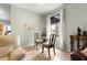 Bright breakfast nook with a glass-top table, comfortable chairs, and natural light at 8782 Sw 82Nd Court Rd, Ocala, FL 34481