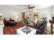 Cozy living room with comfortable seating, a decorative rug, and natural light at 8782 Sw 82Nd Court Rd, Ocala, FL 34481