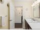 Bathroom featuring a vanity with storage, neutral decor and decorative light fixture at 9504 Sw 97Th Ln # B, Ocala, FL 34481