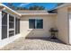 Home's exterior features a patio and screened in porch at 9504 Sw 97Th Ln # B, Ocala, FL 34481