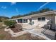 Home's exterior features a patio, screened in porch and landscaping at 9504 Sw 97Th Ln # B, Ocala, FL 34481