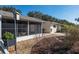 Home's exterior features a patio, screened in porch and landscaping at 9504 Sw 97Th Ln # B, Ocala, FL 34481