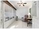 Sunroom with tile floors and plenty of natural light at 9504 Sw 97Th Ln # B, Ocala, FL 34481
