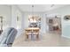 Bright dining room features tile floors, natural light, and views of the back patio at 9863 Sw 63Rd Loop, Ocala, FL 34481
