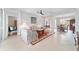 Open concept floor plan with living room, dining area, and access to other rooms at 9863 Sw 63Rd Loop, Ocala, FL 34481