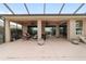 Large screened patio with multiple ceiling fans overlooks the big private and fenced back yard at 9863 Sw 63Rd Loop, Ocala, FL 34481