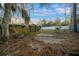 Large backyard with mature trees, and potential for landscaping at 4040 E Fort King St, Ocala, FL 34470