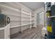 Spacious unfinished basement with ample storage shelves and utility hookups at 4040 E Fort King St, Ocala, FL 34470