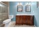 Modern bathroom features double vanity, dual mirrors, and tiled shower at 4040 E Fort King St, Ocala, FL 34470