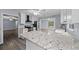Kitchen features granite countertops, stainless steel appliances, and ample cabinet space at 4040 E Fort King St, Ocala, FL 34470