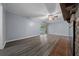 Living room with sliding doors to the backyard and fireplace at 4040 E Fort King St, Ocala, FL 34470
