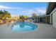 Picture of backyard pool with ladder and stairs on a sunny day at 4040 E Fort King St, Ocala, FL 34470