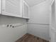 Utility room with updated cabinets and water lines for laundry appliances at 4040 E Fort King St, Ocala, FL 34470