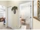 View of the bathroom with tiled shower and neutral colored vanity at 10055 Sw 90Th Loop, Ocala, FL 34481