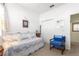 Charming bedroom with a daybed, closet, and ample natural light at 10055 Sw 90Th Loop, Ocala, FL 34481