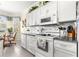 Well-appointed kitchen features modern appliances and a cozy breakfast nook with natural light at 10055 Sw 90Th Loop, Ocala, FL 34481