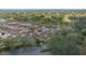 An aerial view of a residential area, set amongst trees and a golf course at 1019 Avalon Ave, Lady Lake, FL 32159