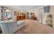 Spacious bonus room with carpet flooring, decorative furnishings, and ample natural light at 1019 Avalon Ave, Lady Lake, FL 32159