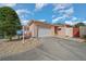 Charming single-story home with an attached two-car garage and well-maintained landscaping at 1019 Avalon Ave, Lady Lake, FL 32159
