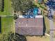 Aerial view of home, pool, deck, and landscaped yard at 10376 Se 43Rd Ct, Belleview, FL 34420