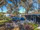 Backyard featuring a pool, patio, and shed at 10376 Se 43Rd Ct, Belleview, FL 34420