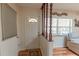 Entryway featuring a decorative door with glass insert and hardwood flooring at 10376 Se 43Rd Ct, Belleview, FL 34420