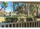 Enjoy this home's screened porch view to this home's beautiful shady lawn at 10376 Se 43Rd Ct, Belleview, FL 34420