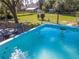 Above ground pool with patio and backyard at 10376 Se 43Rd Ct, Belleview, FL 34420