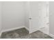 Cozy bedroom featuring neutral walls and carpet flooring at 10512 Sw 49Th Avenue Rd, Ocala, FL 34476
