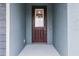 Close-up of the elegant front door with decorative glass and hardware at 10512 Sw 49Th Avenue Rd, Ocala, FL 34476