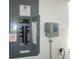 Electrical panel box, adjacent to an irrigation system controller at 11552 Sw 138Th Ln, Dunnellon, FL 34432