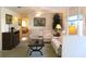 Comfortable living room with ceiling fan and view to the bedroom at 11552 Sw 138Th Ln, Dunnellon, FL 34432