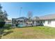 Beautiful backyard featuring screened-in pool at 13677 Sw 40Th Avenue Rd, Ocala, FL 34473