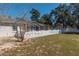 View of the backyard featuring a screened-in pool at 13677 Sw 40Th Avenue Rd, Ocala, FL 34473