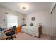 This light-filled bedroom features a comfortable daybed and a dedicated desk area at 13677 Sw 40Th Avenue Rd, Ocala, FL 34473