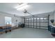 Spacious garage with a high ceiling and a large door, offering ample storage or parking at 13677 Sw 40Th Avenue Rd, Ocala, FL 34473