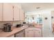 Bright kitchen featuring modern appliances, ample counter space, and an adjacent eat-in area at 13677 Sw 40Th Avenue Rd, Ocala, FL 34473