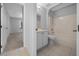 Neutral bathroom with tile floors, and a bathtub with shower at 17799 Se 125Th Cir, Summerfield, FL 34491