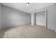 Neutral bedroom with carpet, a ceiling light and a standard sized closet with bi-fold doors at 17799 Se 125Th Cir, Summerfield, FL 34491